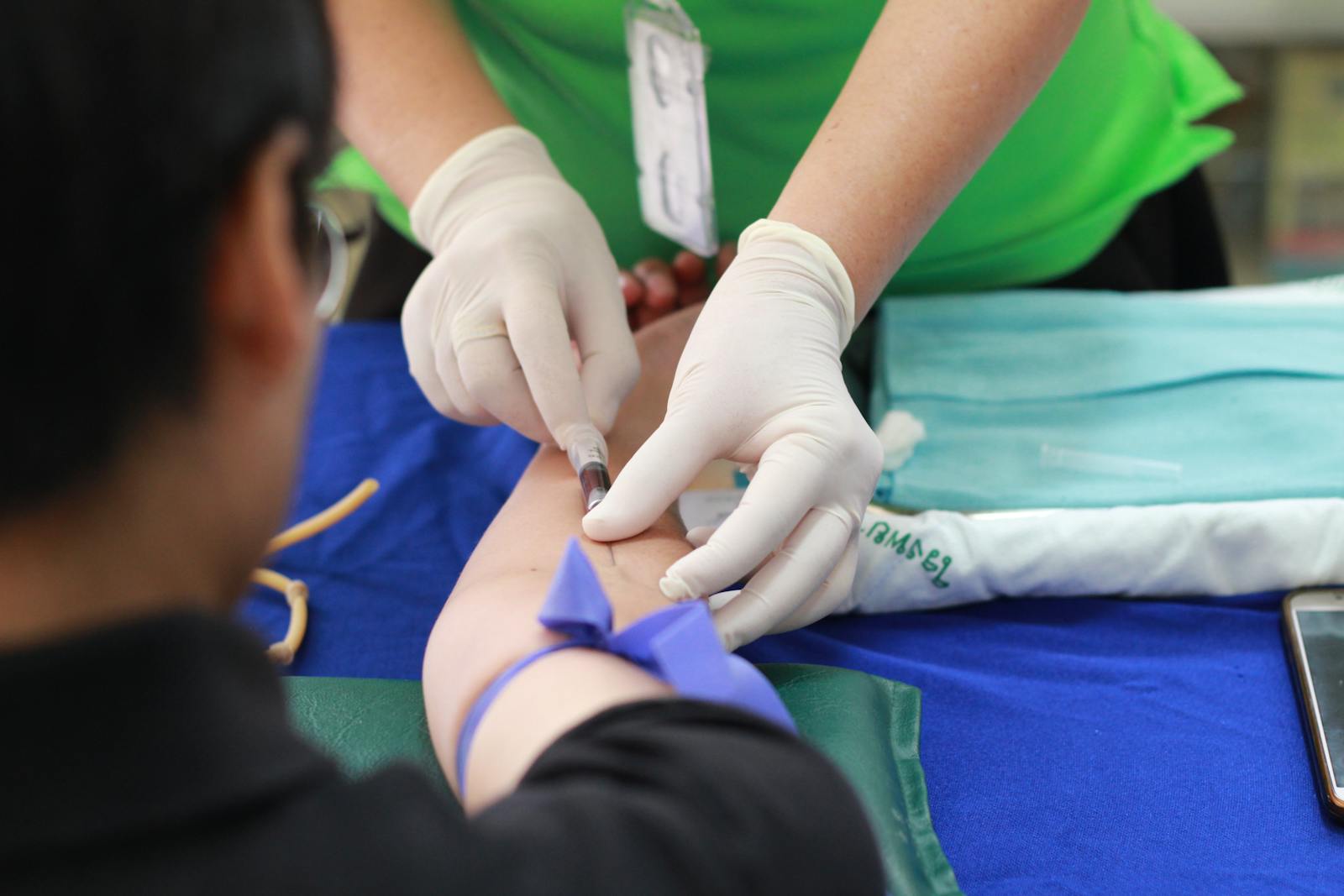 Person Getting His Blood Check health